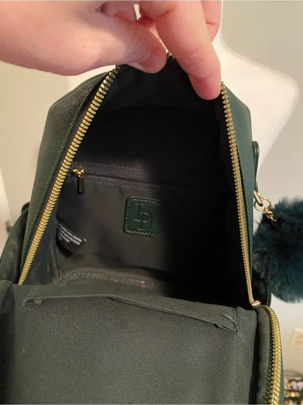 'Love' Embroidered Mini Backpack with Pom Accent in Dark Green